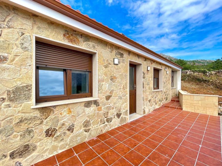 Solpor De Ezaro Villa Dumbria Exterior photo